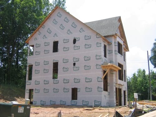 Home protected with house wrap before exterior siding is installed.